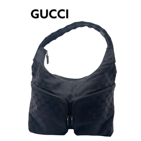 Gucci Black Monogram Tote Handbag
Black canvas tote bag with two front side pock